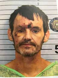 MUGSHOT: Christopher Napoleon Barrett II, 35, was transported back from  McMinn County, Tennessee, and booked into the Whitfield County Jail  Thursday, charged by the GBI with murder- non-family (gun), theft by taking