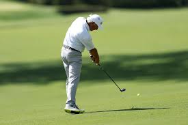 Why is Fred Couples using a yellow ball at the Masters in 2026?