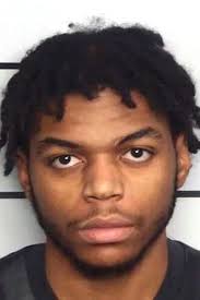 Two men indicted for shooting at teen at bus stop