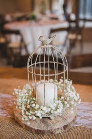 Bird Cage Candle Holder Centerpieces Birdcage Candle Babys Breath Rustic Centerpiece On A Wood Round Magnolia Plantation Wedding In Charleston Sc Charleston Wedd Special Occasions Candl