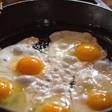 5 Eggs Frying In A Cast Iron Pan Food Cooking Perfect Fried Egg
