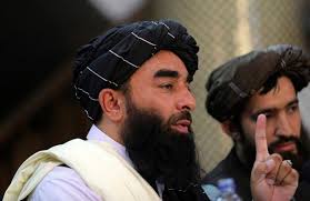 Taliban fighters pose on the back of a vehicle in the city of herat, west of kabul. 9ev3sr4exnxgzm