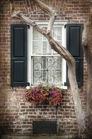 Neutral window box painted to match the house. Charleston Black Shutters Window Flower Box Photograph By Melissa Bittinger