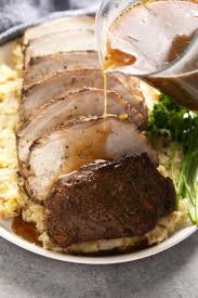 This Is The Most Tender Slow Cooker Pork Loin Roast Recipe Ever It S Served With Potatoes And A Savory Gravy Pork Loin Recipes Slow Cooker Pork Loin Pork Loin