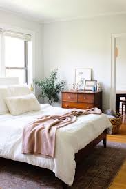 Plus, get more great ideas for decorating your bedroom. A Wow Worthy Eco Chic Before After Bedroom Makeover Theeverygirl Affordable Bedroom Makeover Affordable Bedroom Apartment Bedroom Decor