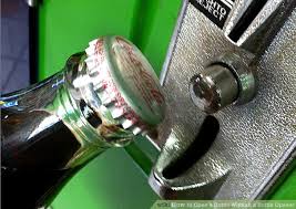You can use a shoe and a nice, solid wall to do it. How To Open A Bottle Without A Bottle Opener