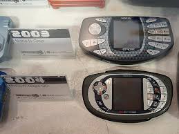 It was unveiled on april 14, 2004, and was released on may 26, 2004, running the same symbian os v6.1 with series 60 1st edition fp1. History Of Video Games Platforms N Gage Wikibooks Open Books For An Open World