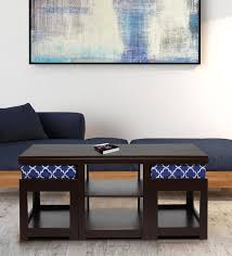 Are you looking for a coffee table for your living room or family room? Buy Rectangular Coffee Table With 2 Cushioned Stools In Indigo Colour By Arra Online Nesting Coffee Tables Sets Tables Furniture Pepperfry Product