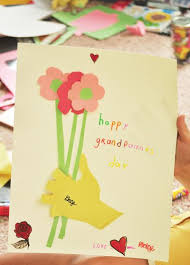 Paint (red, orange, yellow, green, light blue, dark blue, purple) large canvas or paper; Cute Idea Grandparents Day Crafts Flower Crafts Happy Grandparents Day