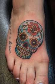 These two contrasting elements can make for a visually striking tattoo that is imbued with profound meaning. What Does Sugar Skull Tattoo Mean Represent Symbolism