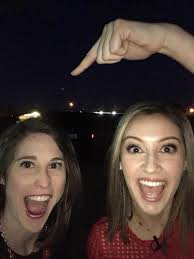 Meteorologist Alex O'Brien and I had to stop outside to check out the moon.  You can barely see the moon in this picture but we were pretty excited  about seeing it! Did