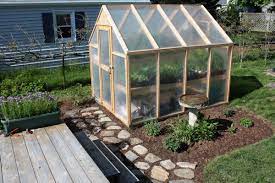 The authors sealed the plywood walls. Building A Greenhouse For Around 150 00 You Can Build This Backyard Greenhouse Simple Greenhouse Greenhouse Plans