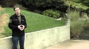 If your wall is straight, line up the first layer of cinder blocks from one end to the other end. Retaining Wall Design Landscaping Network