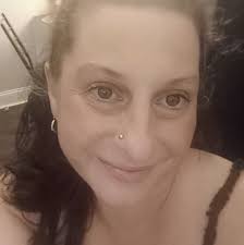 Where can I find a safe place to stay and get help with housing and  employment in Rogers Park?