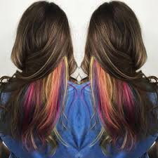 Bleach is brushed on to small sections to lighten the hair. 35 Gorgeous Peekaboo Highlights To Enhance Your Hair