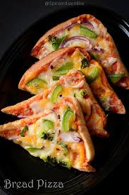 Bread Pizza Recipe Quick And Easy Bread Pizza Spiceindiaonline Tiffin Recipe Indian Food Recipes Vegetarian Pizza Snacks