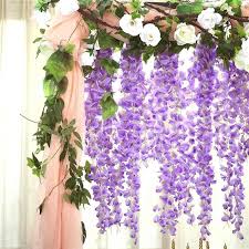 Use garlands or tulle decorations and swag them across the pews or rows of chairs, with a bow or floral piece where they connect.; 42 Artificial Wisteria Vine Silk Hanging Flower Garland Lavender