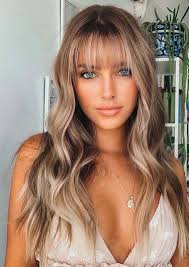 Long layered hair with bangs is a women's haircut ranging from chest to bangs do look good on long hair. Unique Long Balayaged Hairstyles With Bangs For Women In 2020 Stylezco