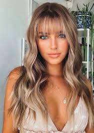 The edgy hairstyle with side swept bangs is a unique hairstyle which suits almost any face shape. Unique Long Balayaged Hairstyles With Bangs For Women In 2020 Stylezco