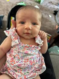 Remove hand from baby photo?