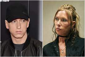 Then, eminem's wife was caught kissing a mutual friend of her husband. Fro0piijroutsm