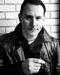 The day before it wasn't snowing. After amber suns made our Earth now  glowing. The trees are strangers, leering, disapproving In the ash of  winter, are minds are now moving My world,