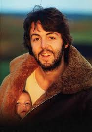 PAUL MCCARTNEY with his new born daughter, MARY, born Aug 28th 1969.