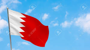 The bahraini flag is sometimes mistaken for the flag of qatar, but that flag is maroon, not red, has bahrain flag: Bahrain Flag On Pole Blue Sky National Flag Of Bahrain Stock Photo Picture And Royalty Free Image Image 164939965