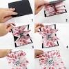 Using cardstock, adhesive, and a little creativity, you can create a paper box that reveals layers of fun photos and accents when you remove the lid. 3