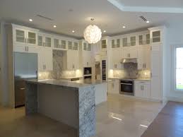 Woodharbor White Modern Kitchen Cabinets Unique Island Alley Design To Build Naples Flori White Modern Kitchen Modern Kitchen Cabinets White Shaker Cabinets