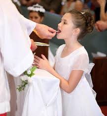 Sacrament of First Communion - Holy Cross Family of Parishes