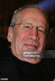 East-German spy master Markus Wolf photographed at the Berlin Wall. News  Photo