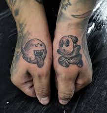 Too bad we don't see more of them in those games. Ricardo Falconeri On Instagram Outra De Hoje Shy Guy E Boo Tattoo Tattoosp Tatuagem Darkart Macabreart Key Tattoo Designs Key Tattoos Tattoos For Guys
