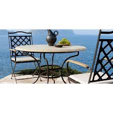 Its bold red chairs will not only. Round Outdoor Dining Table Capri By Manutti
