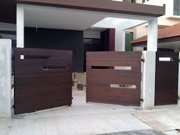 The front gate design for single floored house can be a double door gate with modern day locks. Modern Wooden Gate Designs For Homes Wooden Gate Designs House Gate Design Gate Design