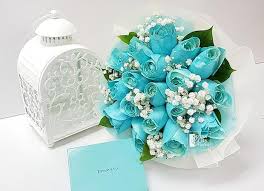 Maybe you would like to learn more about one of these? Tiffany Blue Rose 24hrs City Florist