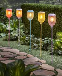 Solar stakes, used to line paths and driveways, are found at nearly all home improvement stores. Pastel Solar Lantern Garden Stakes Ltd Commodities