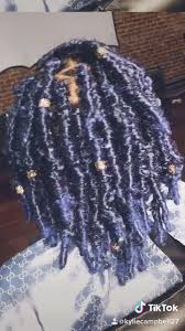 How to do butterfly locs, how to seal the ends, maintenance tips and how to remove butterfly locs. Blue Butterfly Locs Video Black Girl Natural Hair Black Girl Braided Hairstyles Hair Ponytail Styles