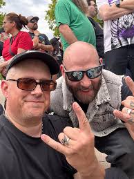 Find guy met in merch line at Mile High?