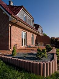Terrasse Von Einem Doppelhaus Mit Rotem Dach Von Eco System Haus Massivhaus Bauen Style At Home Massivhaus