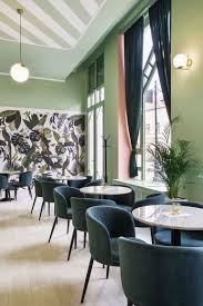 kissmiklos decorates gard ann hungarian cafe with sugar sweet pastels interior design modern interior design interior