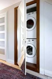15 Idees Pour Dissimuler Son Lave Linge Armoires De Buanderie Idee Deco Buanderie Placard Buanderie