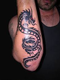 You can find tribal tattoo arm items such as juice lasting ink tattoos, full arm tattoo sticker, watercolor feather and arm sleeve tattoo in aliexpress easily. Black Tribal Dragon Tattoo On Right Lower Arm For Men