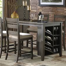 A decade ago, when a scattered group of office workers revolted and got up out of their chairs, most of them just stood up and raised their desks to counter height. Signature Design By Ashley Rokane Counter Height Dining Table With Storage Hayneedle