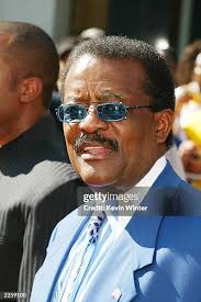 News crews attempt to speak with Randy McMurray, an attorney at The... News  Photo