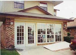 Garage renovated for family play. Image From Http Www Aroomatthetop Co Uk Garage Conversions Images Gallery Exterior Garage Exterior Garage Bedroom Conversion Garage Conversion To Family Room