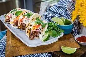 It's the perfect main course for your next bbq and the leftovers make a delicious for the past decade my dad and i would smoke brisket, pulled pork and ribs whenever i would come home to visit in the summer. Bbq Brisket Tacos With Sunshine Slaw Brisket Tacos Bbq Brisket Smoked Cooking