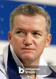 Image of Peter Gilmour, skipper of One World of the USA listens