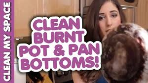 Take the pans out from beneath the burners and wipe them well with dish soap and water to remove grease. How To Clean The Burnt Bottom Of A Pot Or Pan Clean My Space