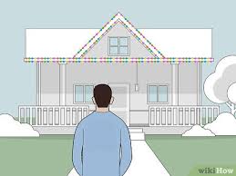 Our favorite outdoor christmas light ideas include adding roof lights to your holiday display! How To Put Up Christmas Lights Outside 13 Steps With Pictures